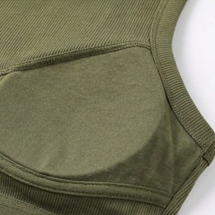 Supportive women's ribbed tank with integrated bra, great for everyday layering.