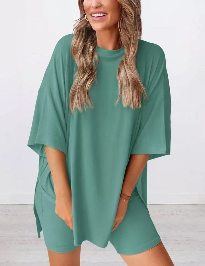 Soft women's two-piece shorts set, featuring an oversized tee. Ideal for relaxation and loungewear.