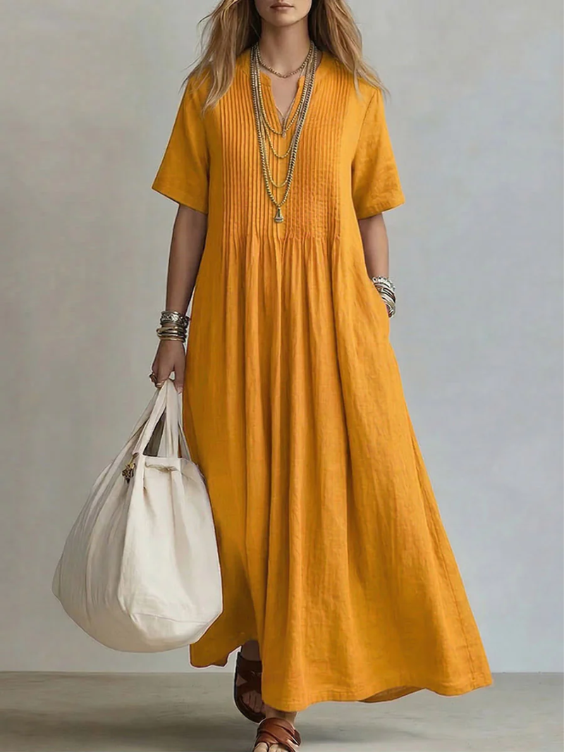 Versatile women's pleated V-neck short sleeve maxi dress, a comfortable choice for spring, summer, or vacation.