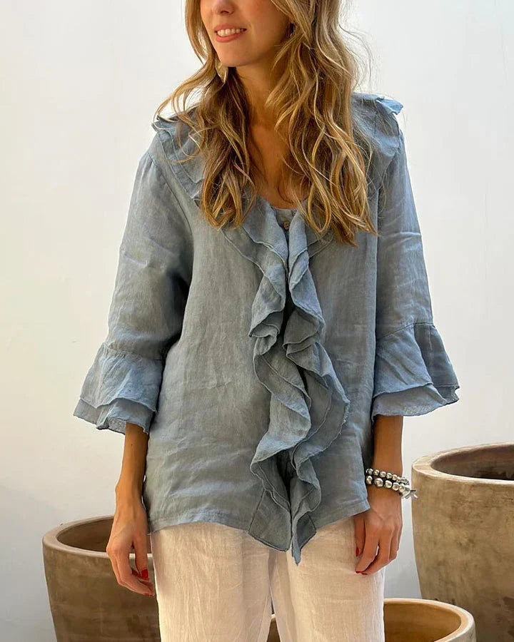 Elegant women's ruffled 3/4 sleeve blouse with a relaxed fit, perfect for spring and summer casual wear.