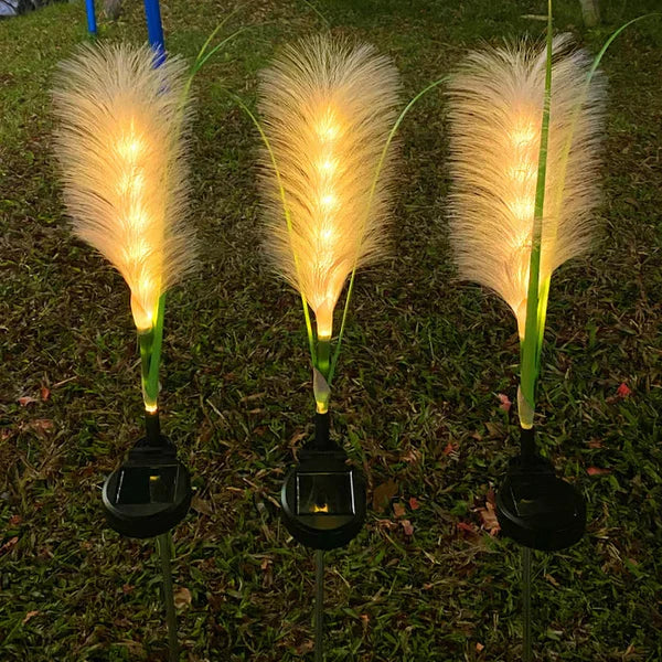 Weather-resistant reed-look decorative garden lighting for beautiful outdoor decor.