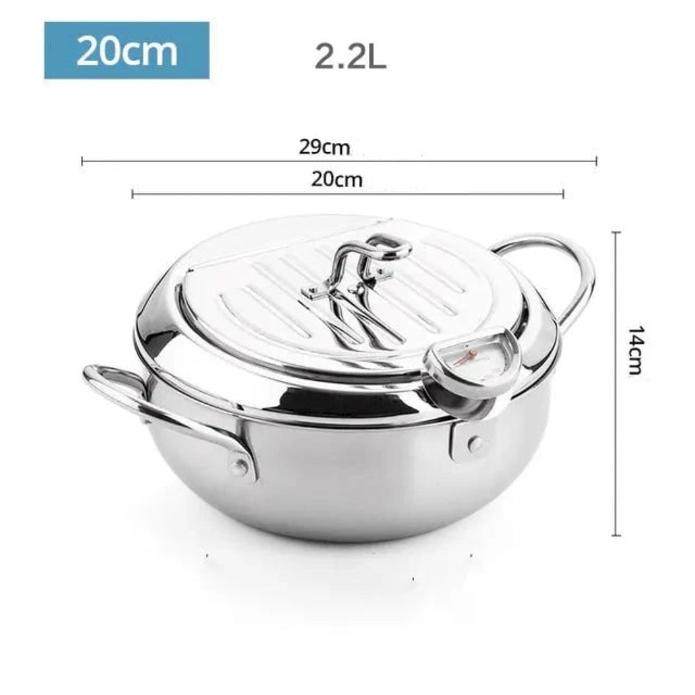Stainless steel smart deep fryer cooking golden crispy tempura. Perfect for home frying with precise temperature control.