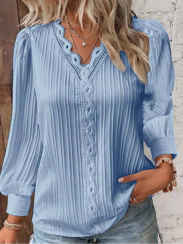 Fashionable women's ribbed texture V-neck long sleeve blouse, ideal for autumn daily wear.