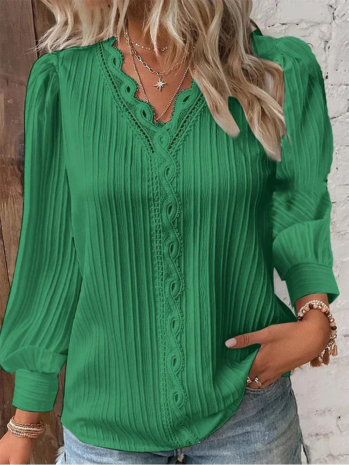 Elegant women's V-neck long sleeve top with ribbed texture, great for versatile casual chic outfits.