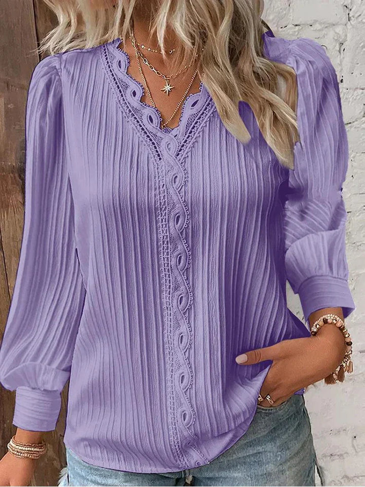 Soft ribbed women's V-neck long sleeve blouse, a fashionable and comfortable choice for daily wear.