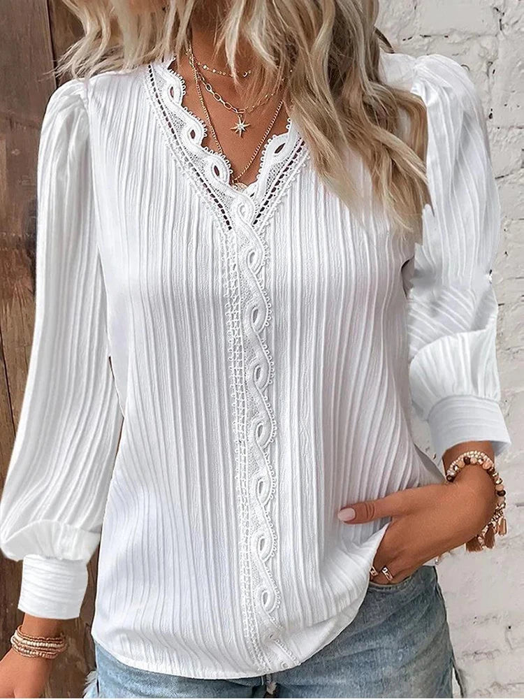 Women's casual chic V-neck long sleeve top with a distinct ribbed texture, perfect for any day.