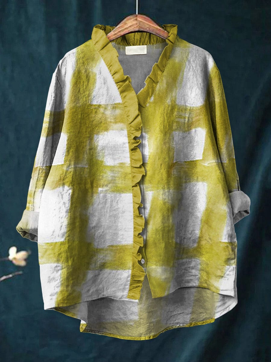 Women's yellow printed ruffle long-sleeve blouse. Elegant and versatile casual wear with a stylish pattern.