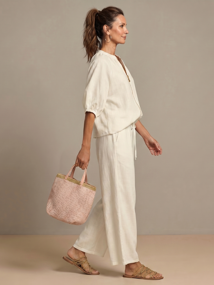 Women's casual chic co-ord set with comfortable wide leg pants and a versatile zip top.
