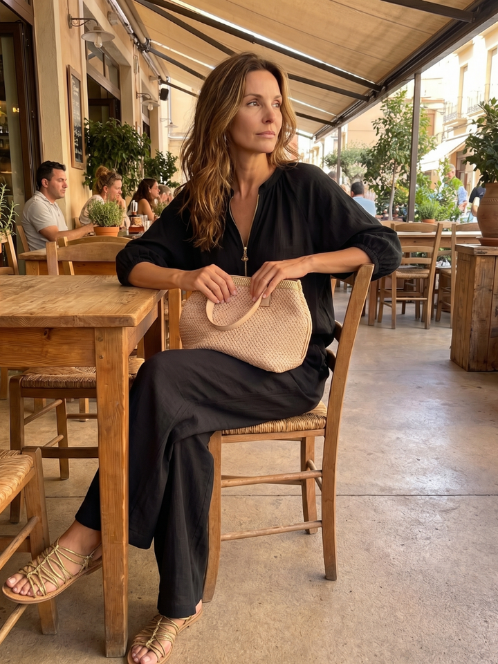 Sophisticated women's co-ord with a contemporary zip-front top & classic wide leg pants.