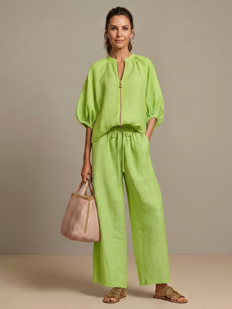 Effortless women's co-ord set with modern wide leg pants and a functional zip-front top.