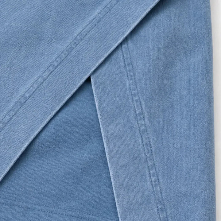 Detail of the comfortable elastic waist on women's acid wash mini skort, part of a stylish co-ord.