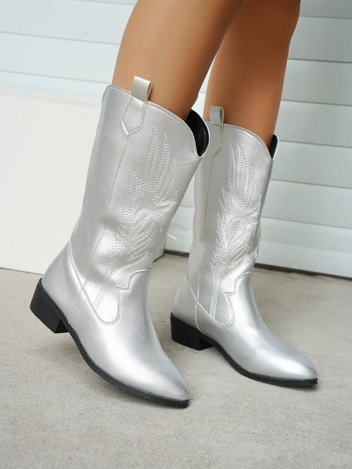Stylish women's Western ankle boots, pointed toe, combining comfort & trend.