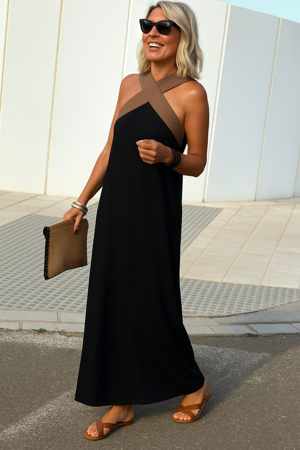 Women's elegant crossover halter maxi dress with a flattering silhouette, ideal for summer occasions.