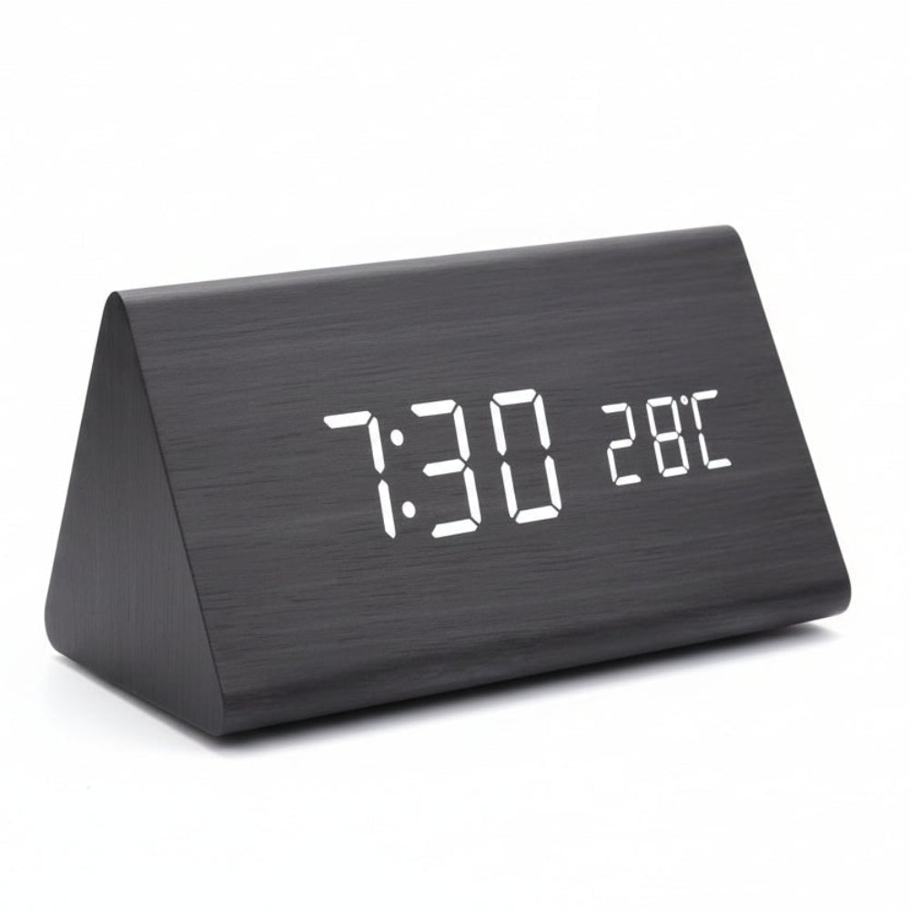 Modern digital alarm clock with bright LED display; ideal bedside or office desk accessory.