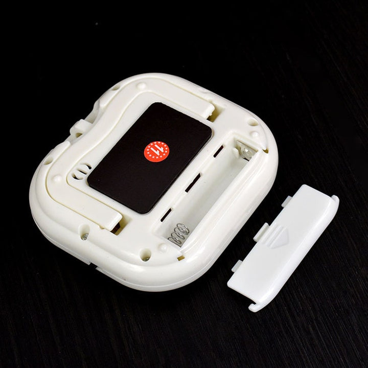 Digital kitchen timer with magnetic back for effortless cooking & baking. Easy-to-use countdown timer for meal prep.