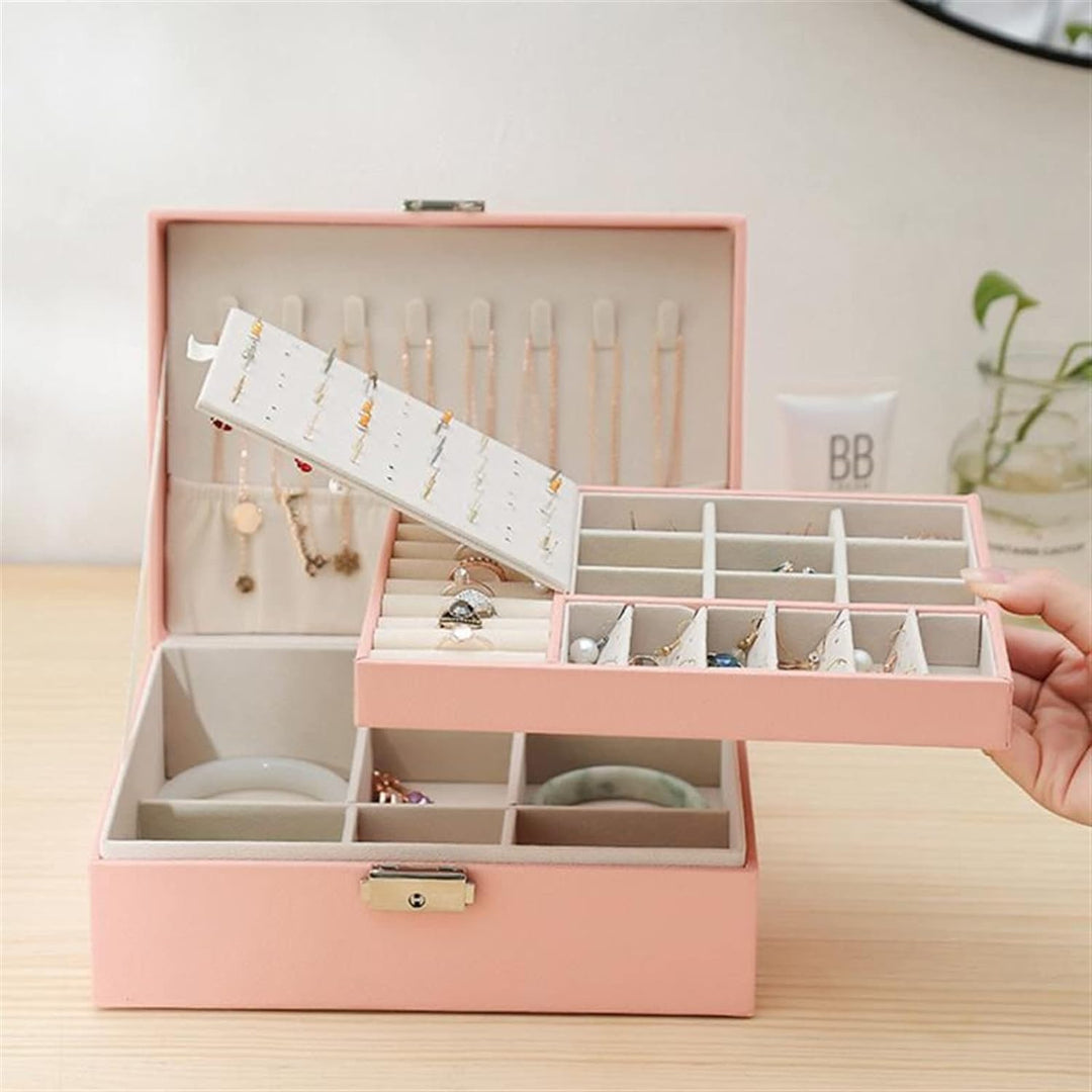 Open view: Women's double-layer leather jewelry organizer with compartments for rings, necklaces & more.