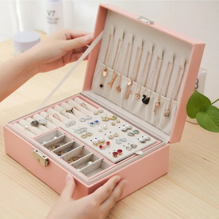 Chic double-layer leather jewelry box, perfect for keeping women's rings, bracelets, and earrings neatly.