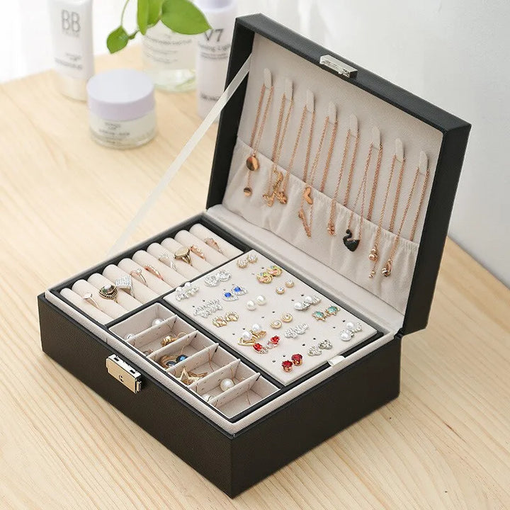 Compact & elegant double-layered leather jewelry box, a stylish storage solution for women's precious items.