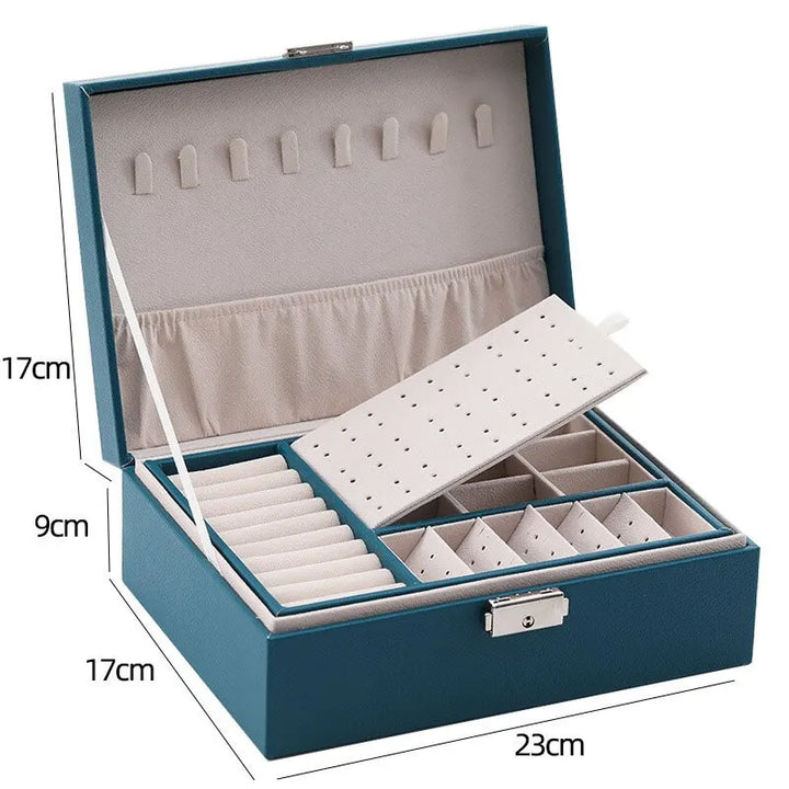 Elegant double-layered leather jewelry box for women, perfect for organizing rings, necklaces & earrings.