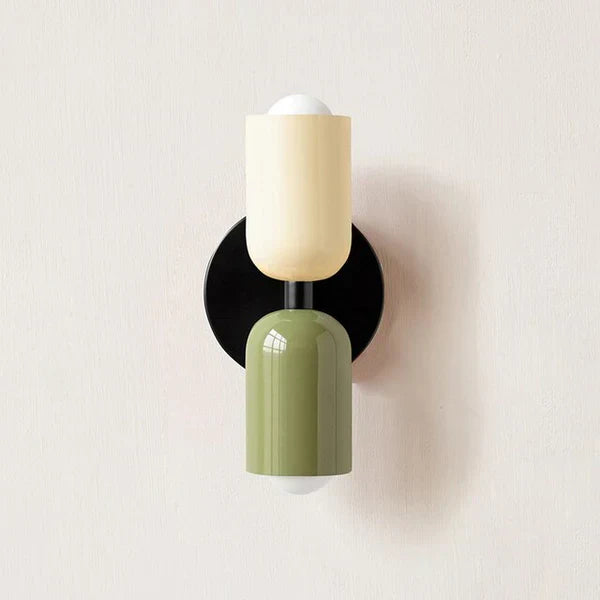 Stylish DualGlow wall sconce, black metal & resin, for contemporary and efficient wall lighting.