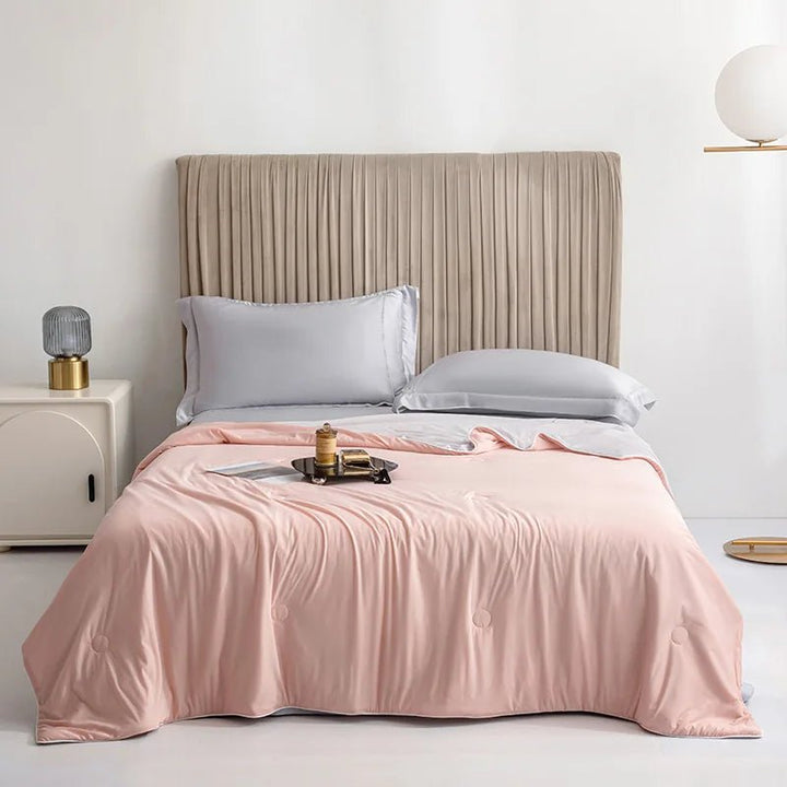 Soft, breathable double-sided cooling blanket perfect for warm weather and summer nights. Soothing comfort.