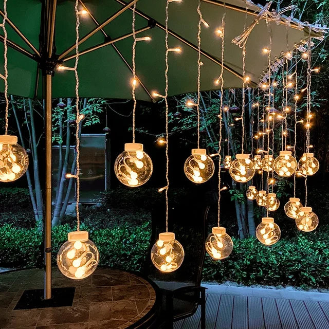 Garden path lit by waterproof LED string lights. Durable outdoor lighting for enchanting garden ambiance.