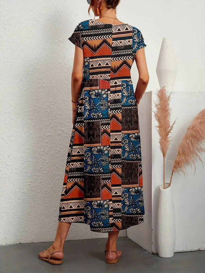 Versatile women's printed maxi dress, a comfortable short sleeve A-line design for effortless summer style.