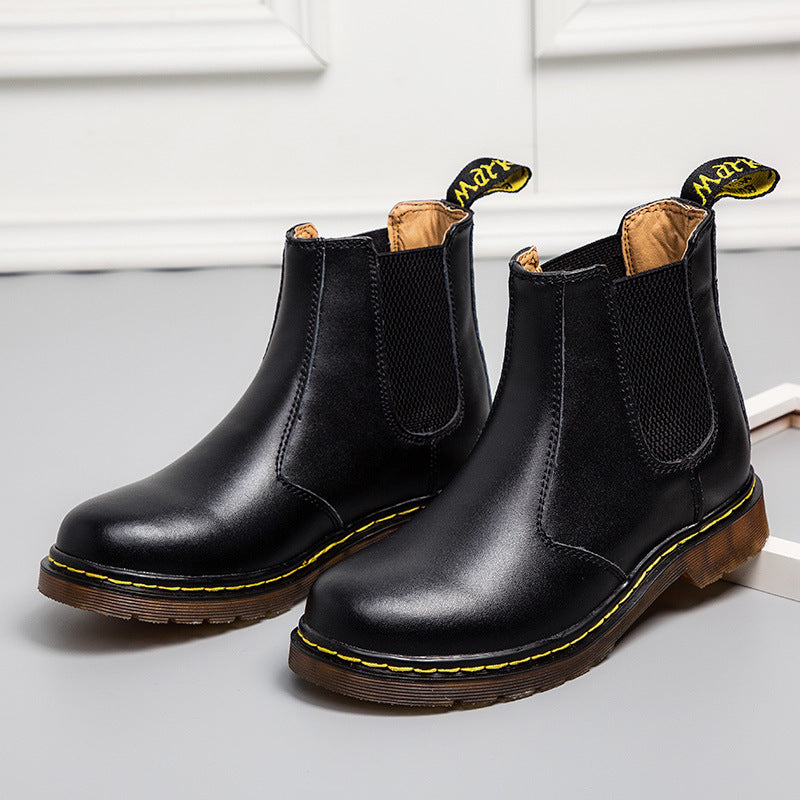 Unisex Chelsea boots with a sturdy traction sole, ensuring stable footing and comfort for all-day wear.