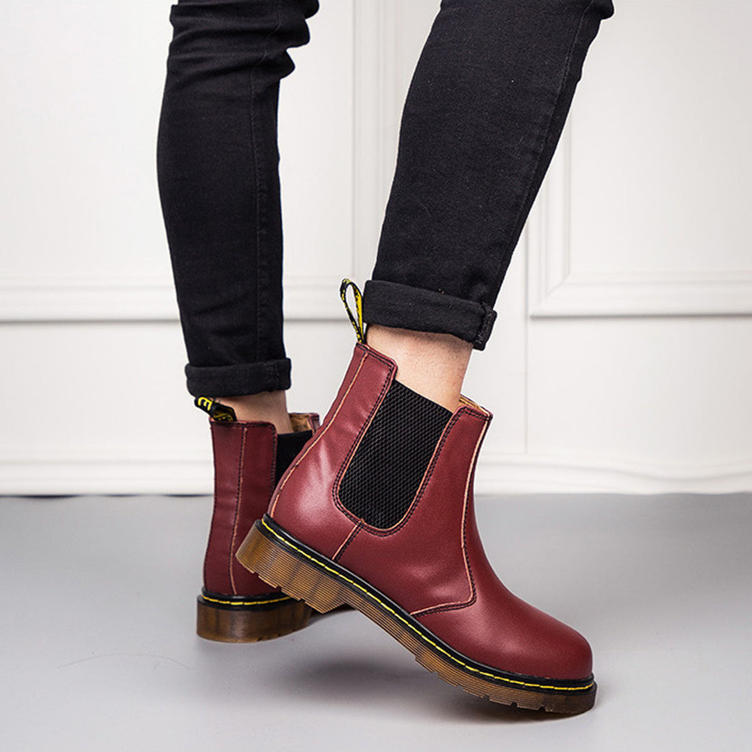 Comfortable unisex Chelsea boots with a durable traction sole for stable footing and versatile style.