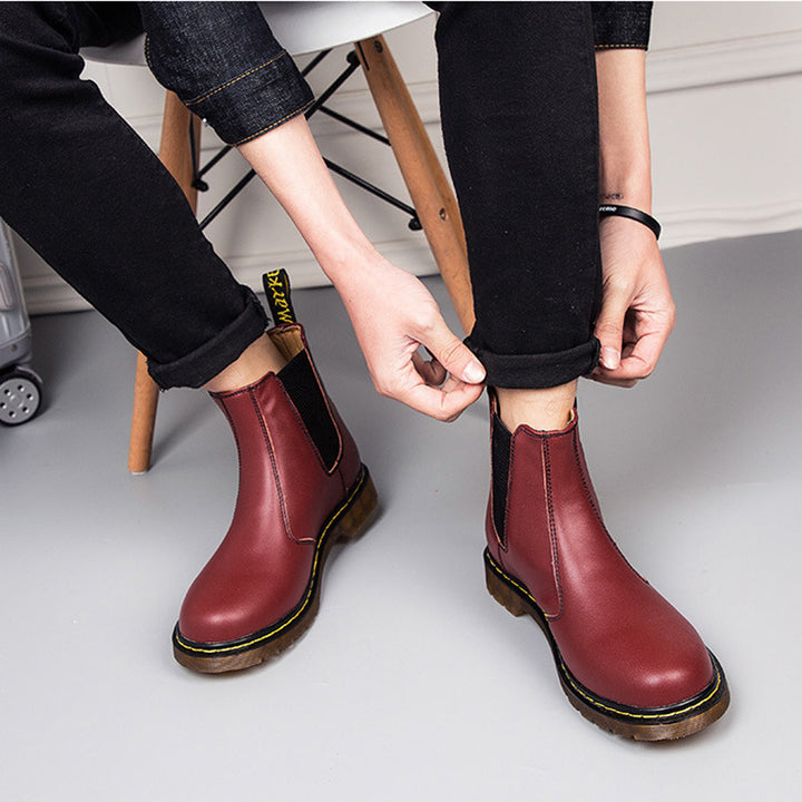Unisex black leather Chelsea boots, slip-on ankle boots with elastic side panels for easy everyday wear.