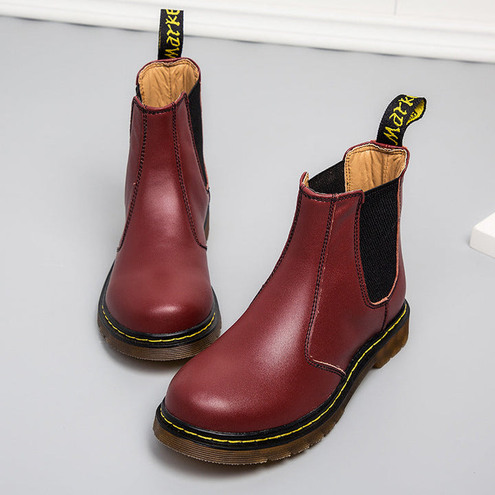 Versatile unisex slip-on Chelsea boots, offering stylish comfort, stable footing, and everyday elegance.
