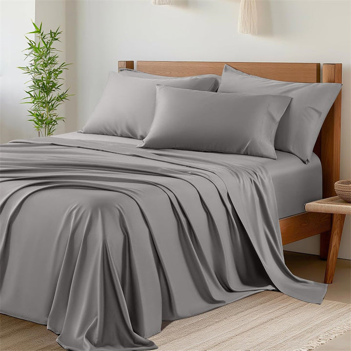 Luxury bamboo cooling bed sheet set with fitted sheet, flat sheet, and pillowcases for ultimate sleep comfort.