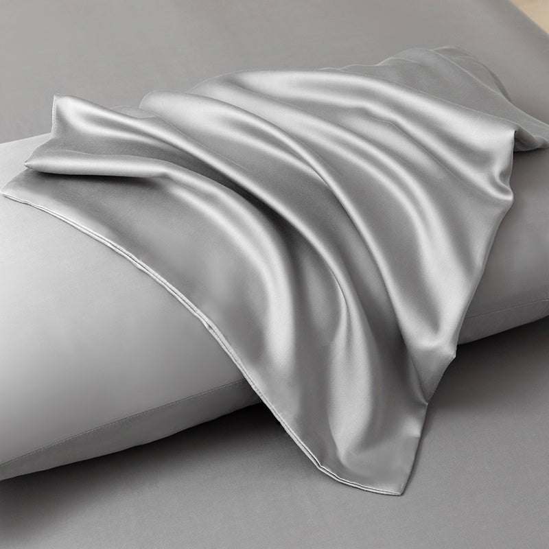 Cooling bamboo bedding set: flat sheet, fitted sheet, and pillowcases for refreshing, moisture-wicking sleep.