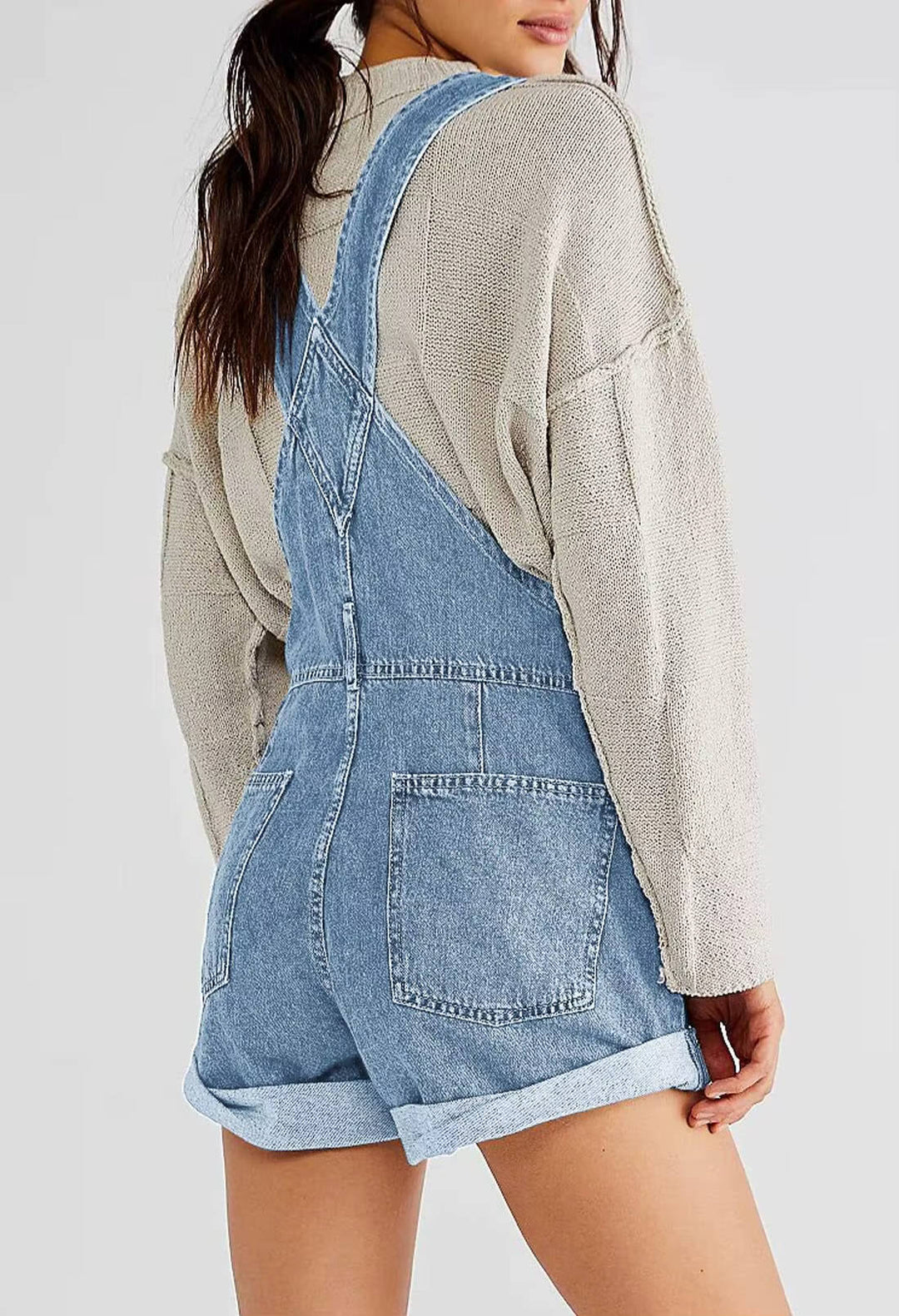 Stylish women's denim shorts overalls, versatile casual wear with practical pockets for summer.