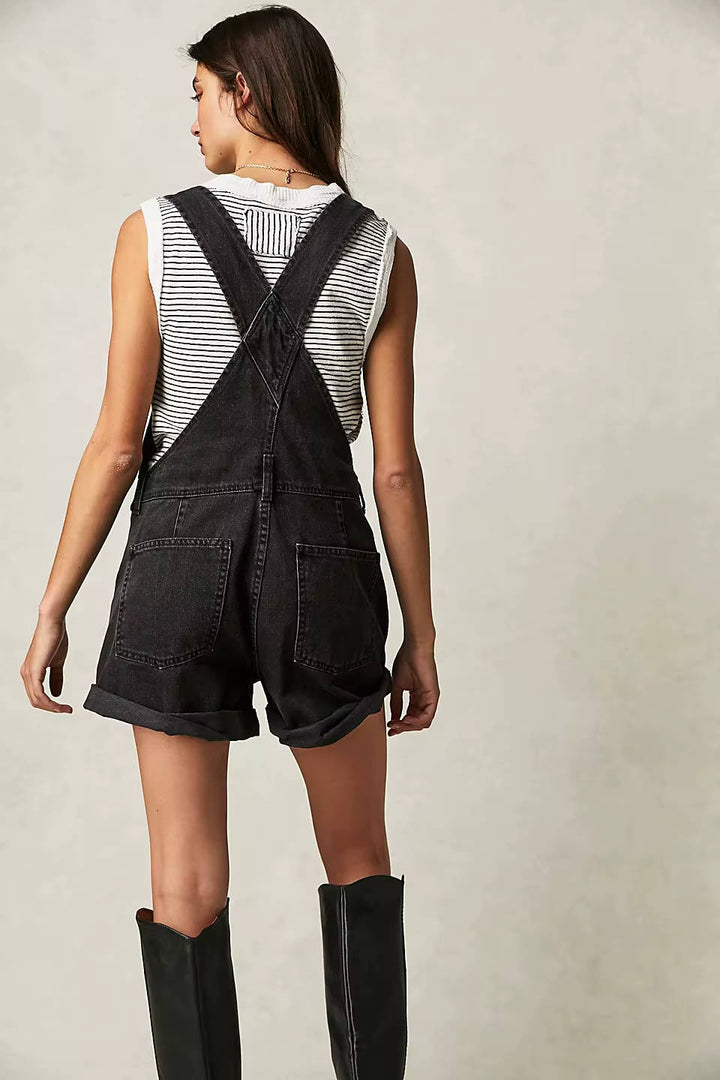 Blue denim overall shorts for women, stylish & casual summer romper with utility pockets.