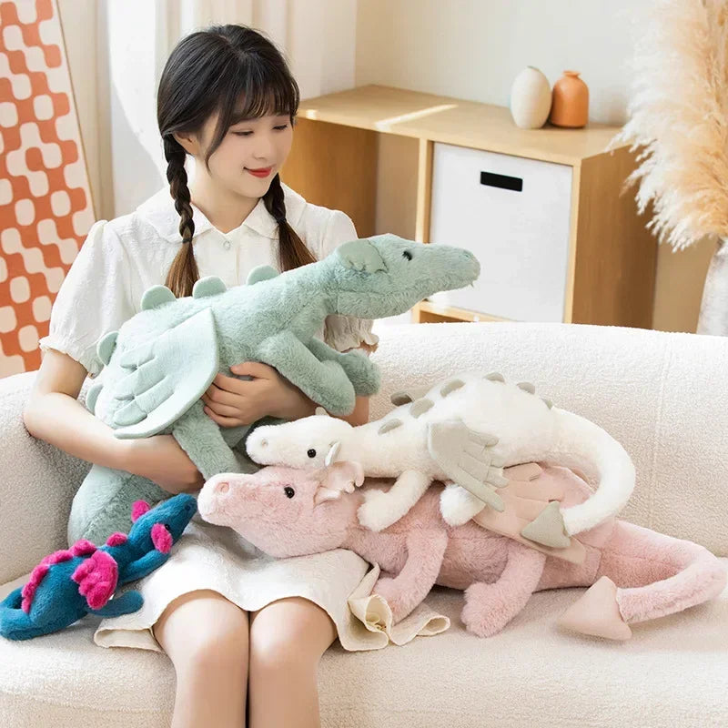 Adorable green plush dragon, a cuddly companion for children's playtime. Perfect soft stuffed animal fantasy toy.