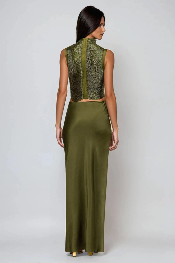 Sophisticated women's olive green two-piece set: sleeveless draped high neck top and elegant maxi skirt for special occasions.