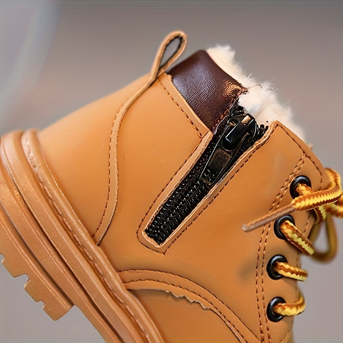 Children's durable waterproof outdoor winter boots. Warm lining & grippy sole for cold weather playtime.