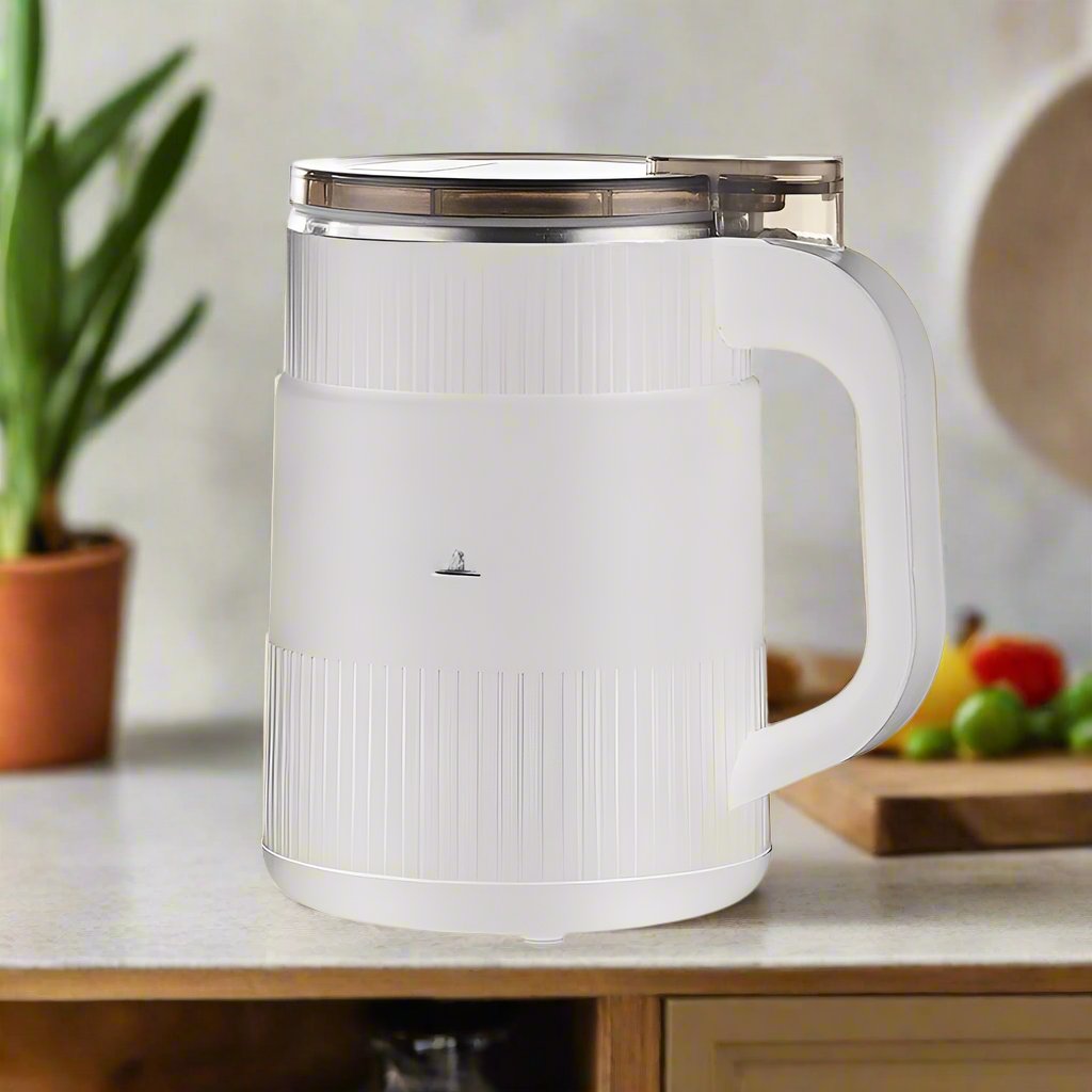 Close-up of an electric grain mill, showcasing its capability to produce fine, fresh flour for home baking.