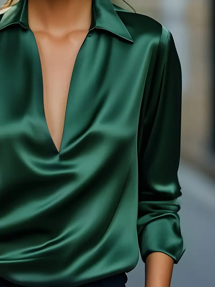 Women's premium V-neck top, long sleeve for versatile, casual chic office wear.