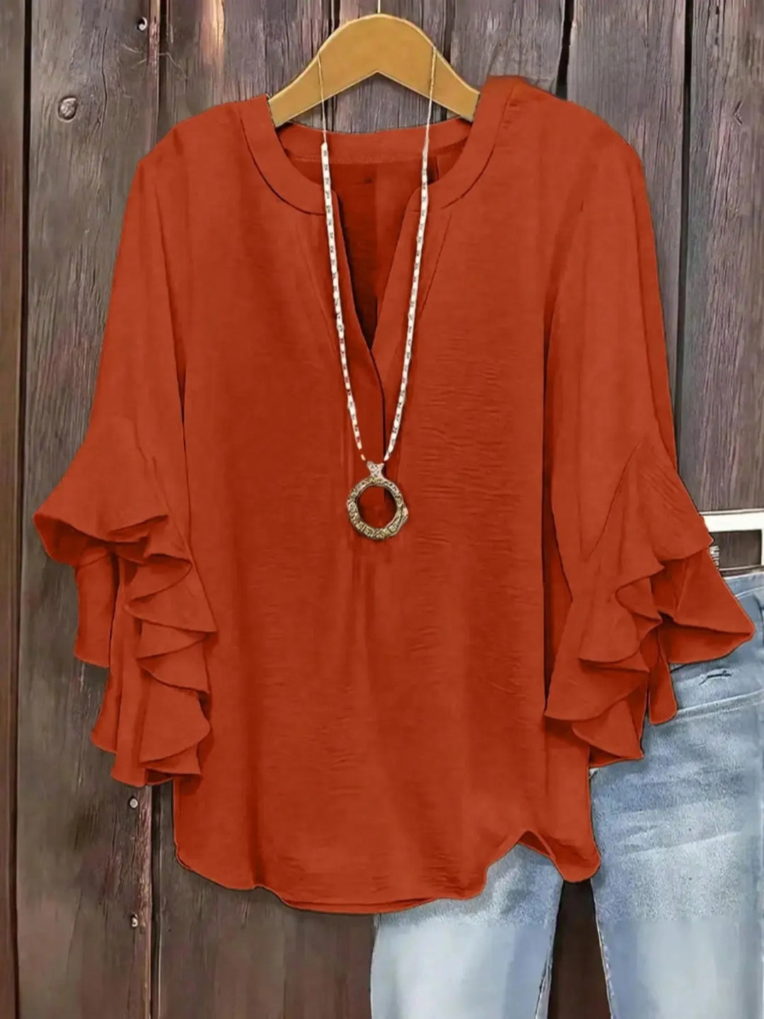 Relaxed fit short sleeve V-neck blouse, a comfortable women's top for any day.