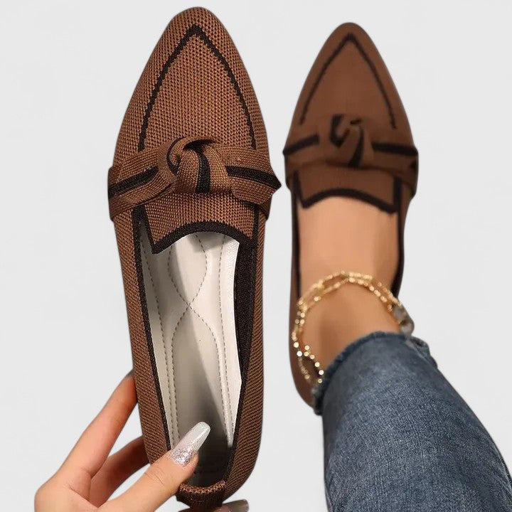 Comfortable women's loafers with a sophisticated pointed-toe and fashionable knot detail for everyday elegance.