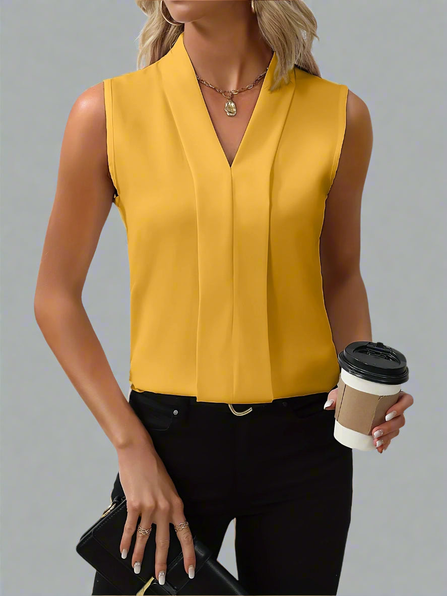 Elegant women's sleeveless V-neck top, a versatile layering piece for smart casual office wear or summer style.
