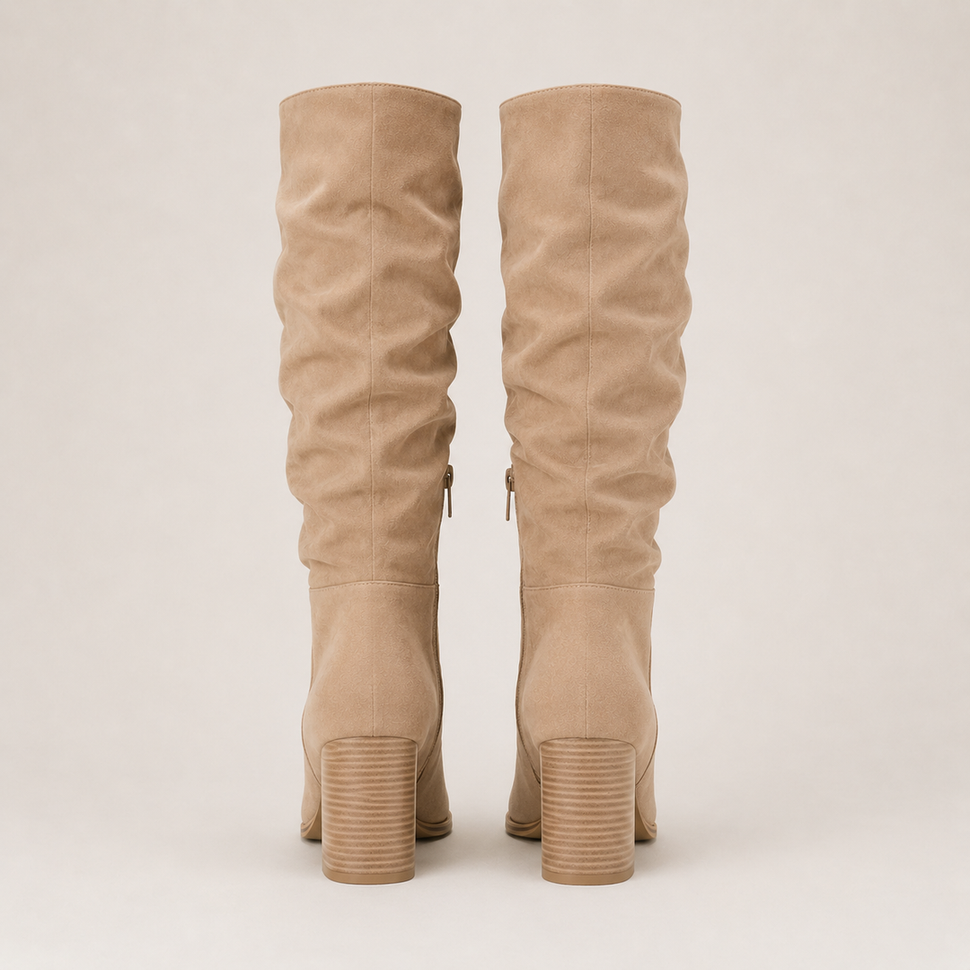 Stylish women's ankle boots in a classic design, versatile for casual or chic everyday outfits. Premium quality footwear.