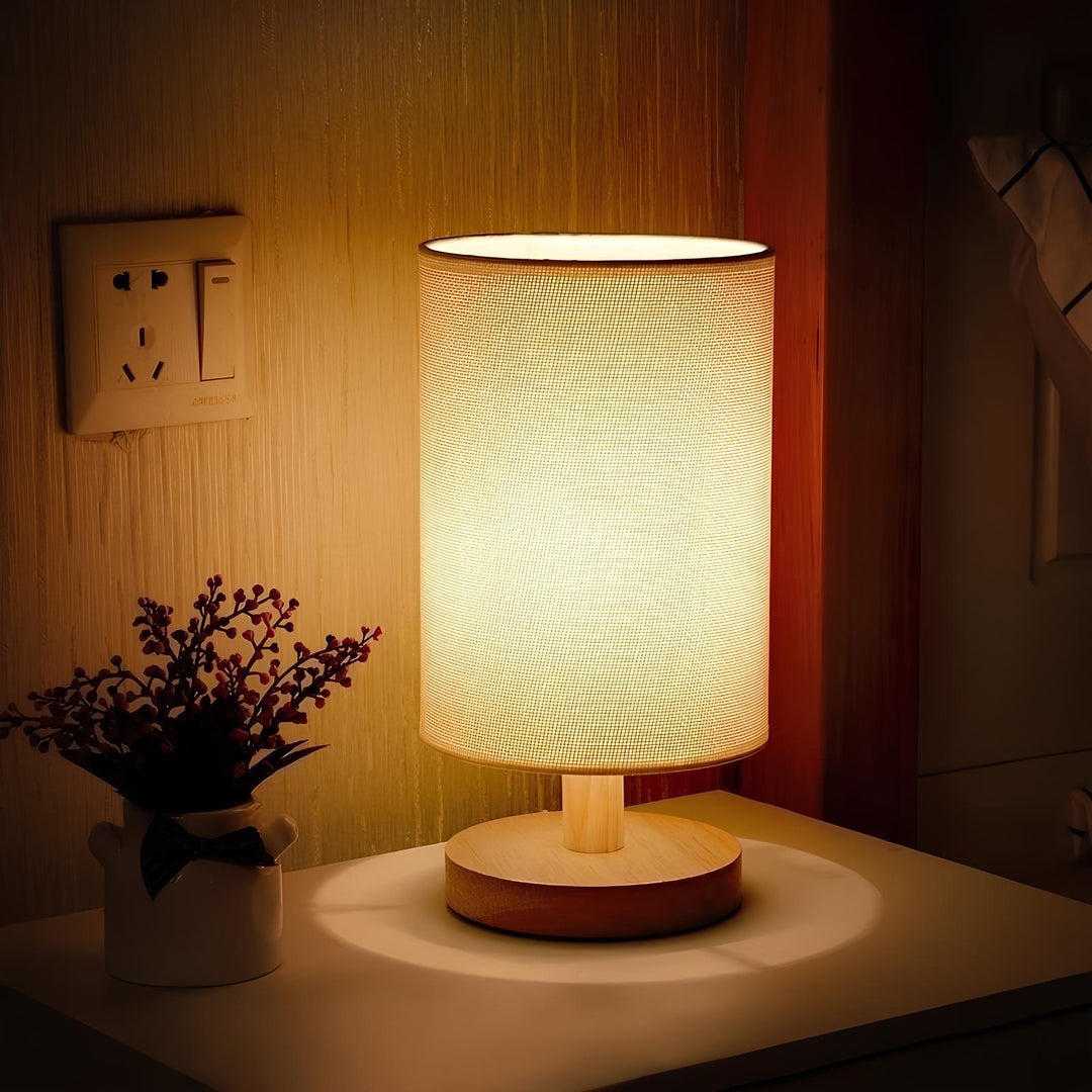 Elegant Dimmable Table Lamp with a natural wood base and soft fabric shade, perfect for living room ambiance.