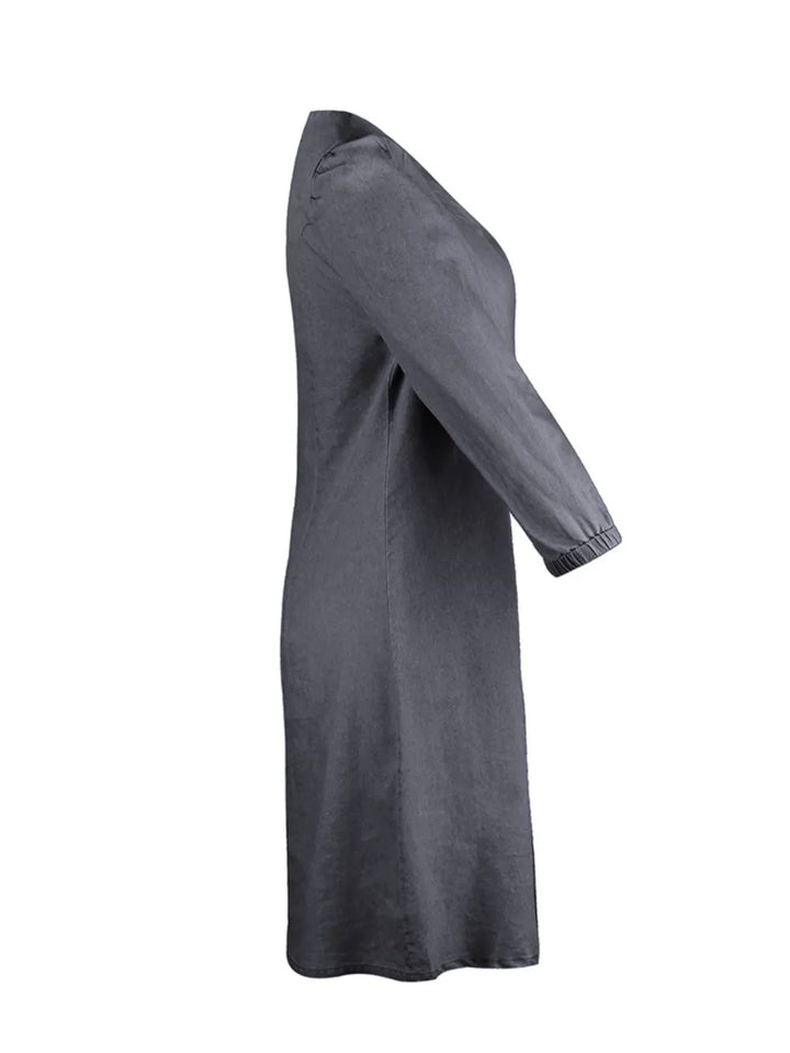 Lightweight summer V-neck dress with half sleeves, a comfortable & flattering women's staple.