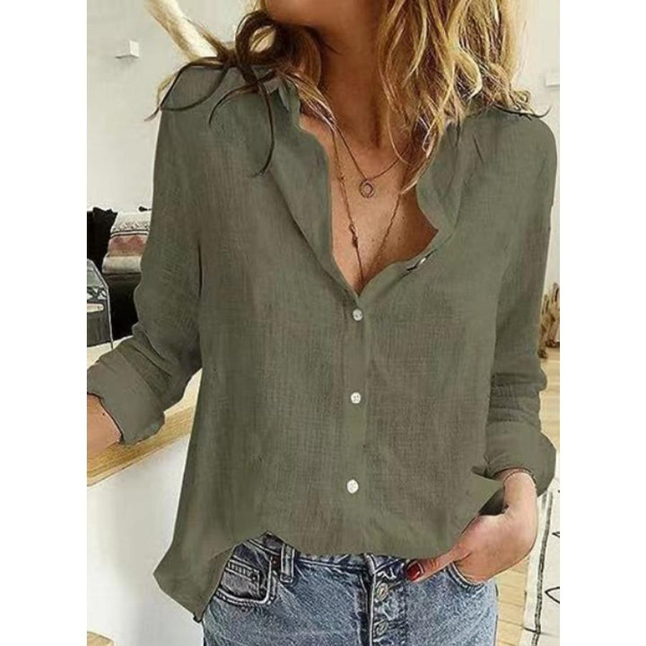 Blue women's long sleeve casual top. Super comfortable and flattering fit, perfect for everyday wear.