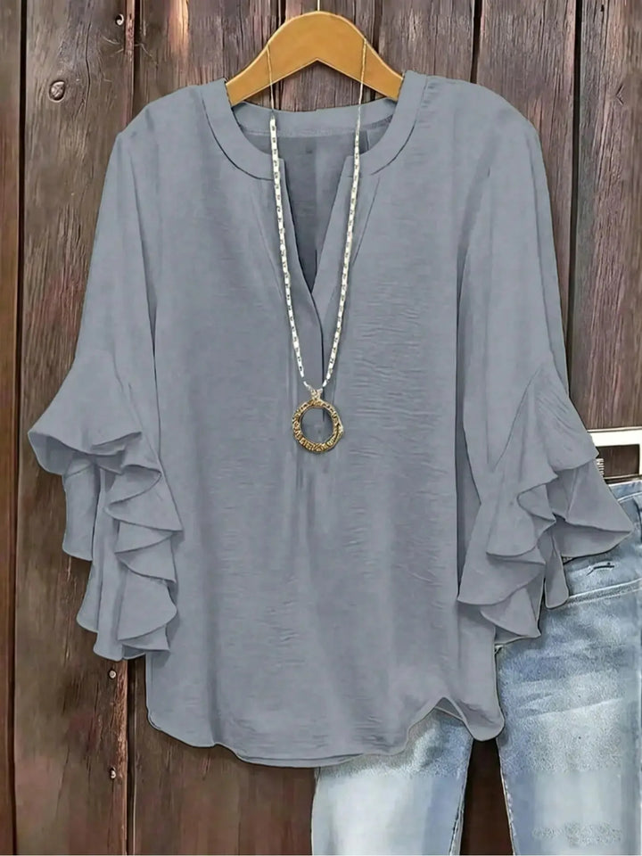 Chic women's casual short sleeve V-neck blouse, ideal for comfort and style.
