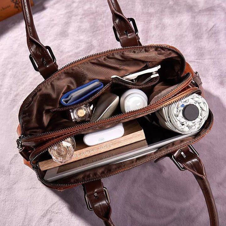 Elegant green genuine leather shoulder bag for women. A stylish & durable everyday handbag.