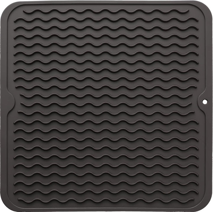 Contemporary silicone drying mat, an essential for modern kitchen organization.